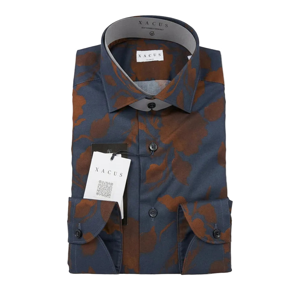 Floral patterned shirt with a tag on a white background