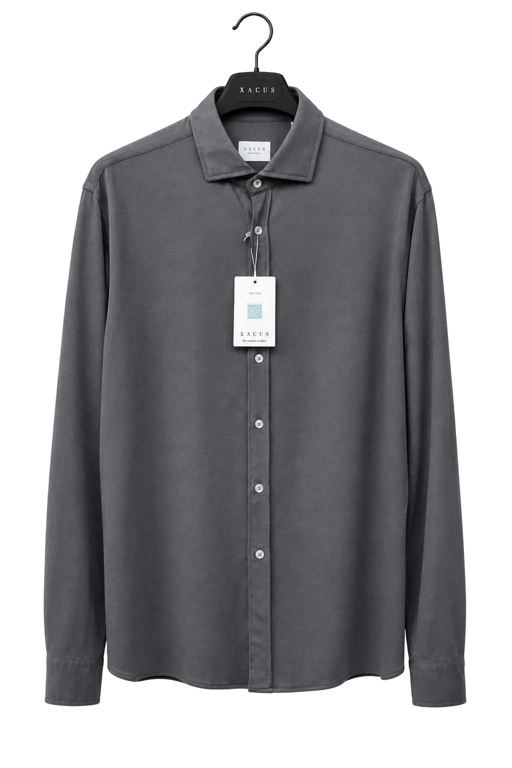 A dark gray long-sleeve button-up shirt by Sacor, hanging on a black hanger against a bright yellow wall. The shirt has a white product tag attached to the collar.