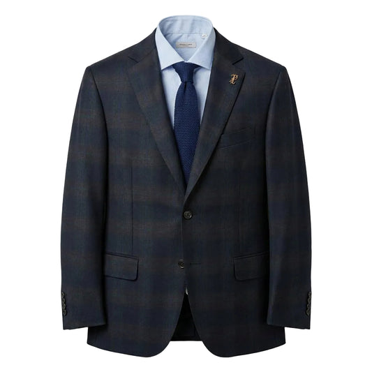 A navy overcheck blazer with a lapel pin, displayed on a mannequin.